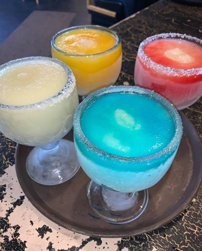 Four frozen margaritas multiple flavors